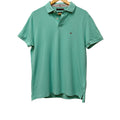 Tommy Hilfiger light blue men's polo in size L
