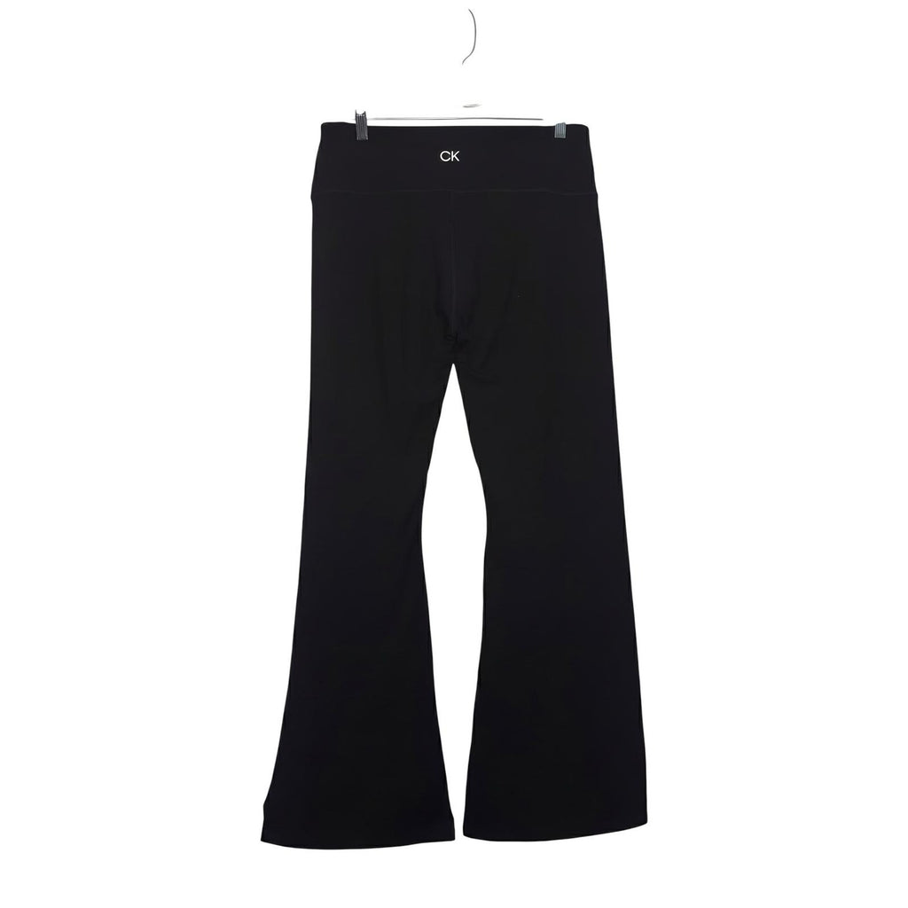 Black Calvin Klein Performance Stretch pants and zip-up sweatshirt set