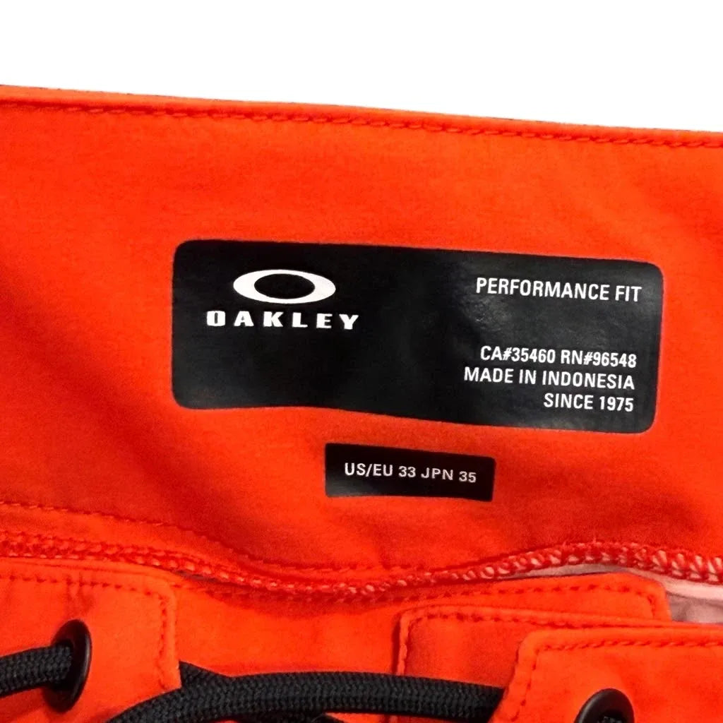 Oakley Performance Fit Colorblock Floral Board Shorts - label