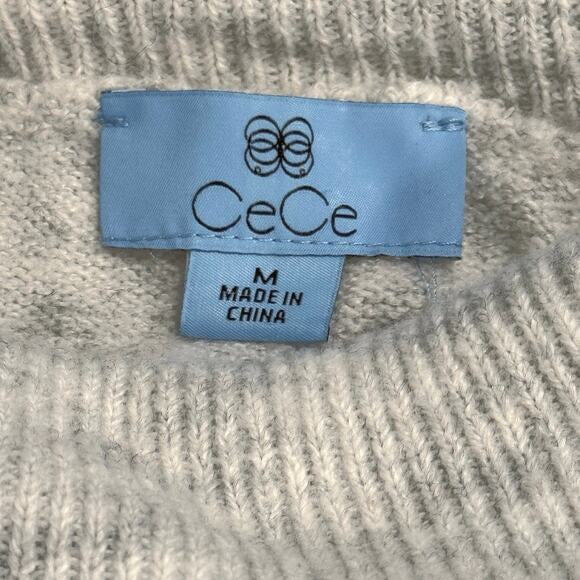 Ce Ce woman's sweater striped in blue white and grey with ski patterns size M