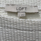 Loft woman's short sleeve top in white size M with tie bow at the bottom