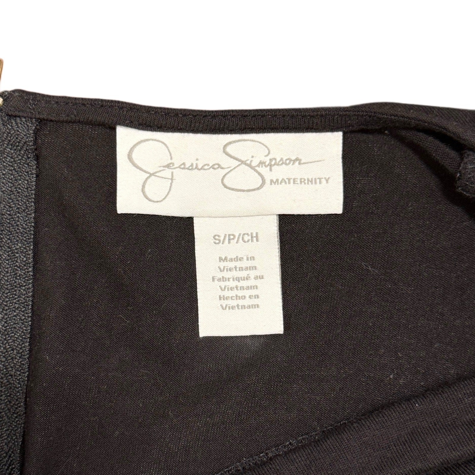 Black woman's Jessica Simpson spandex black top