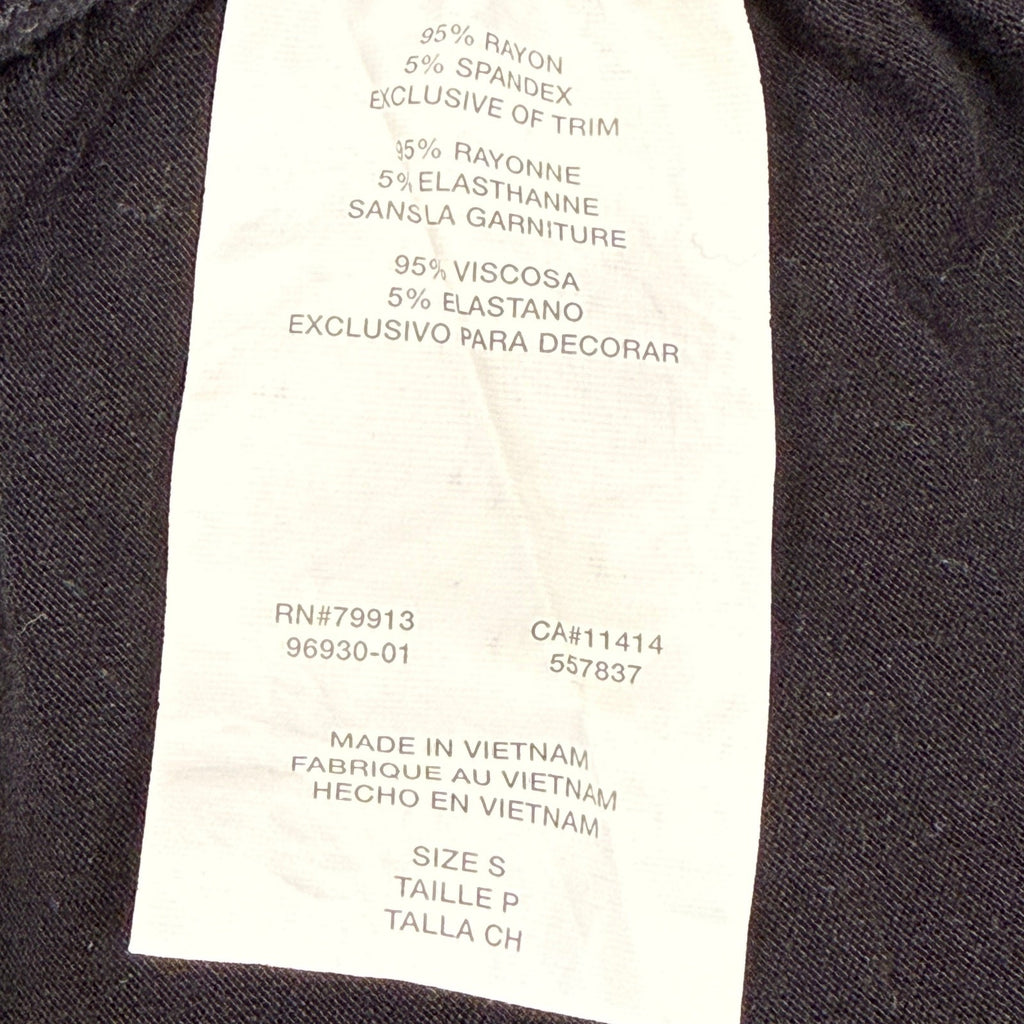 Black woman's Jessica Simpson spandex black top