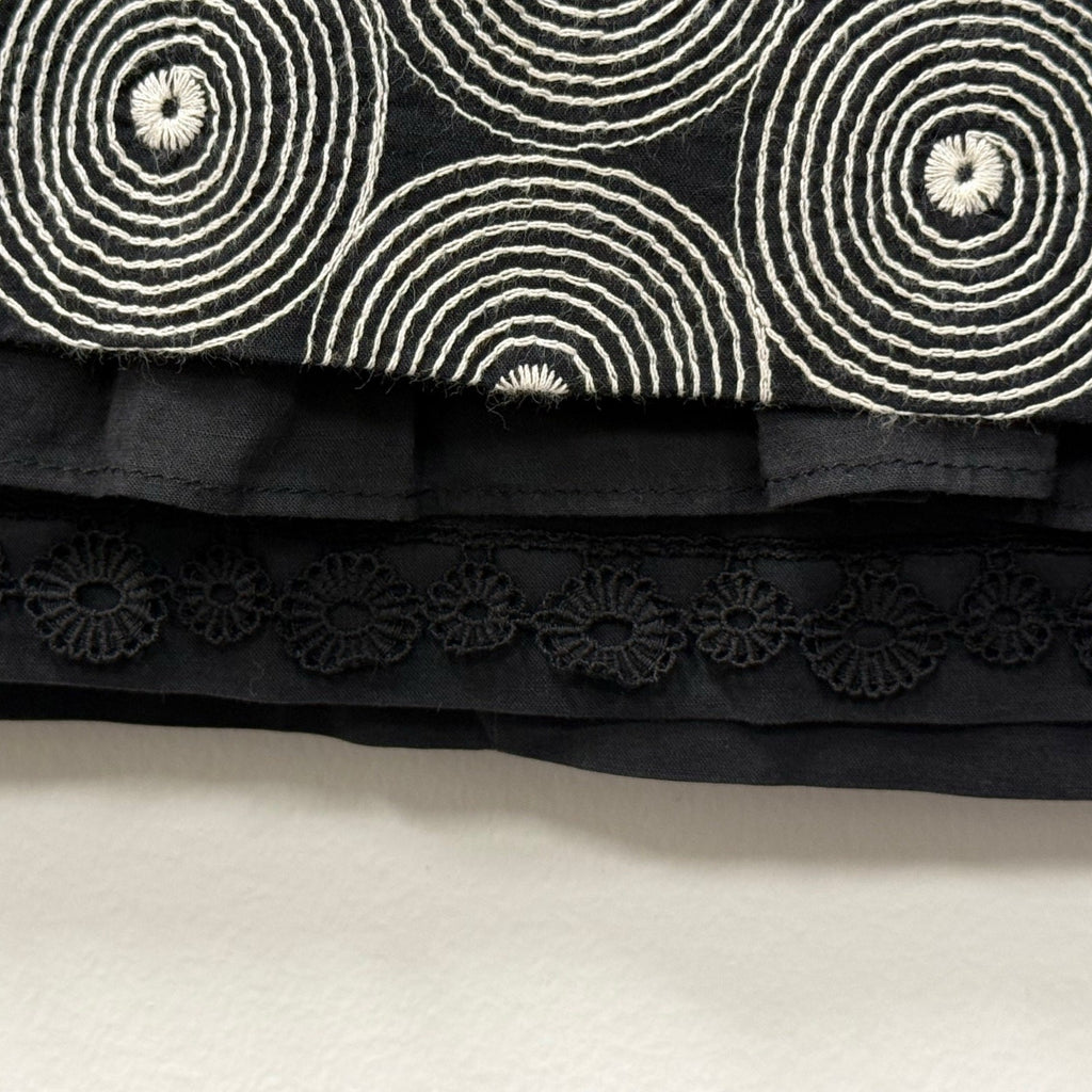 Floreat mini skirt in black and white circle pattern size 4