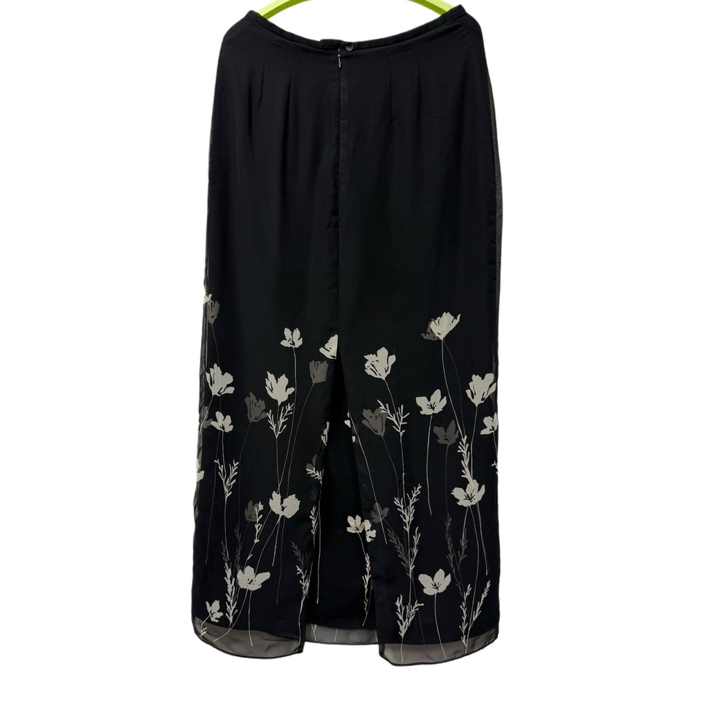 Ann Taylor woman's black skirt with white flowers in size 4