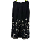 Ann Taylor woman's black skirt with white flowers in size 4