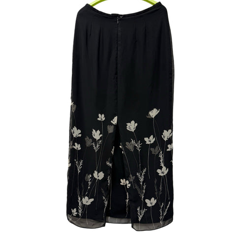 Ann Taylor woman's black skirt with white flowers in size 4