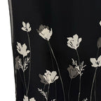 Ann Taylor woman's black skirt with white flowers in size 4