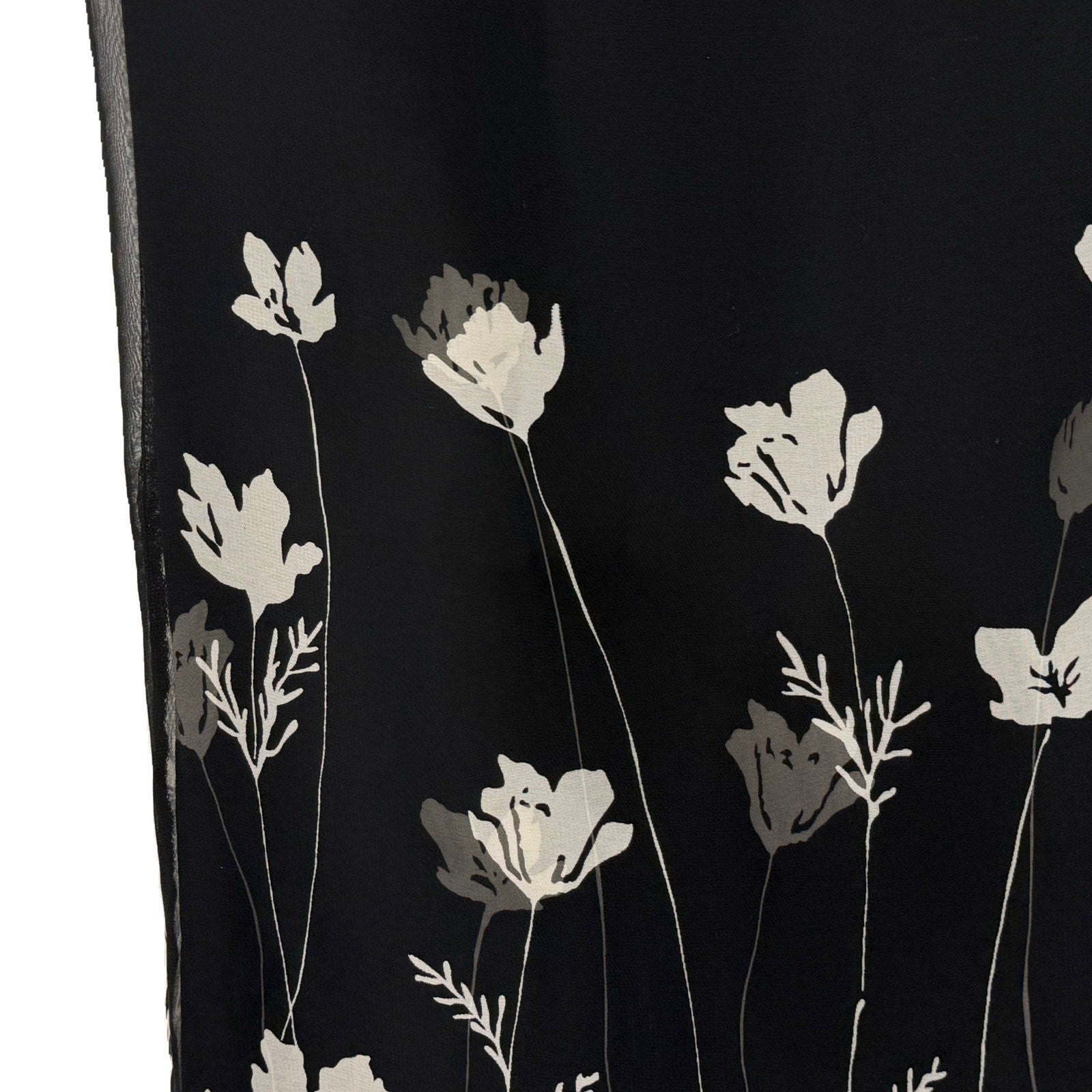 Ann Taylor woman's black skirt with white flowers in size 4