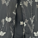 Ann Taylor woman's black skirt with white flowers in size 4