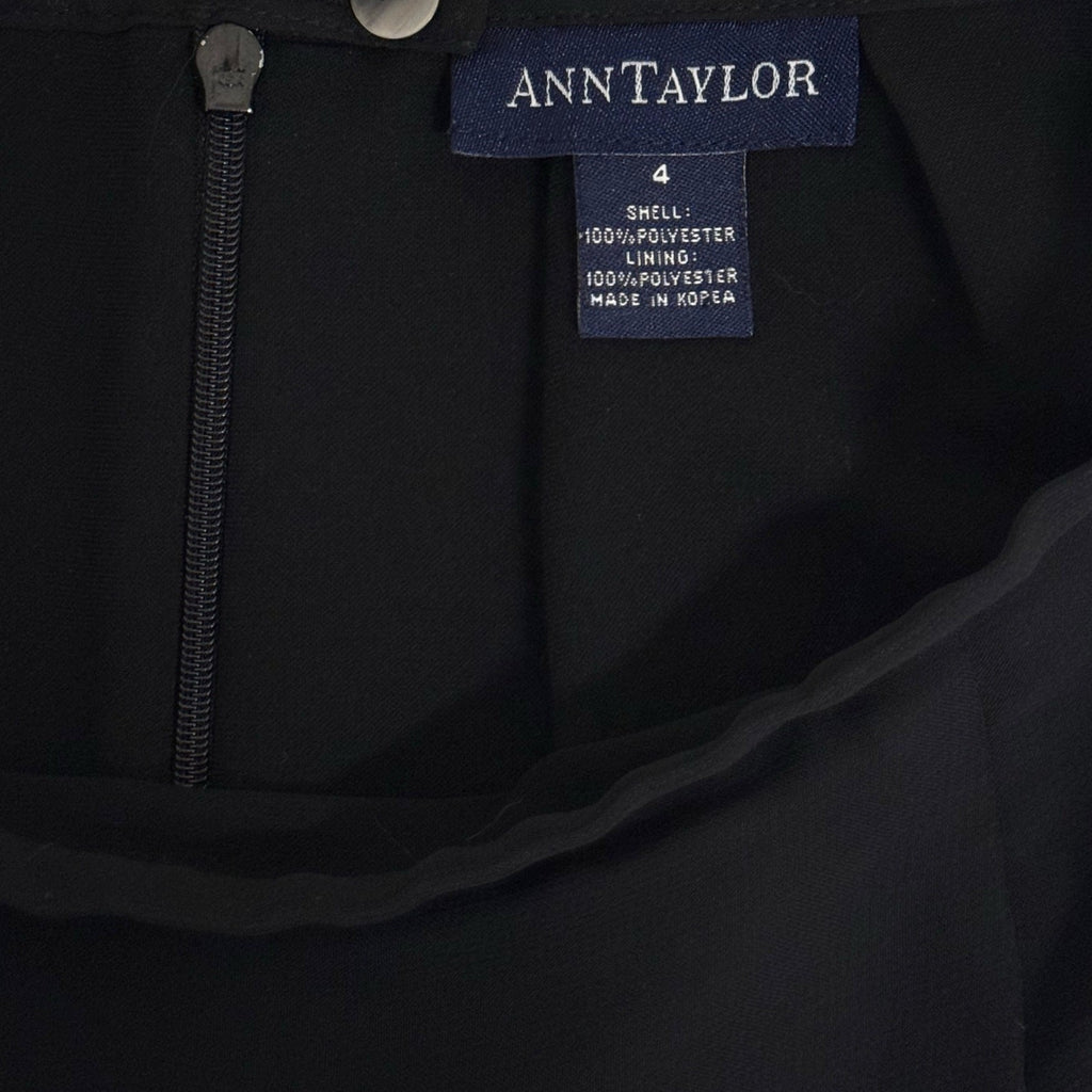 Ann Taylor woman's black skirt with white flowers in size 4