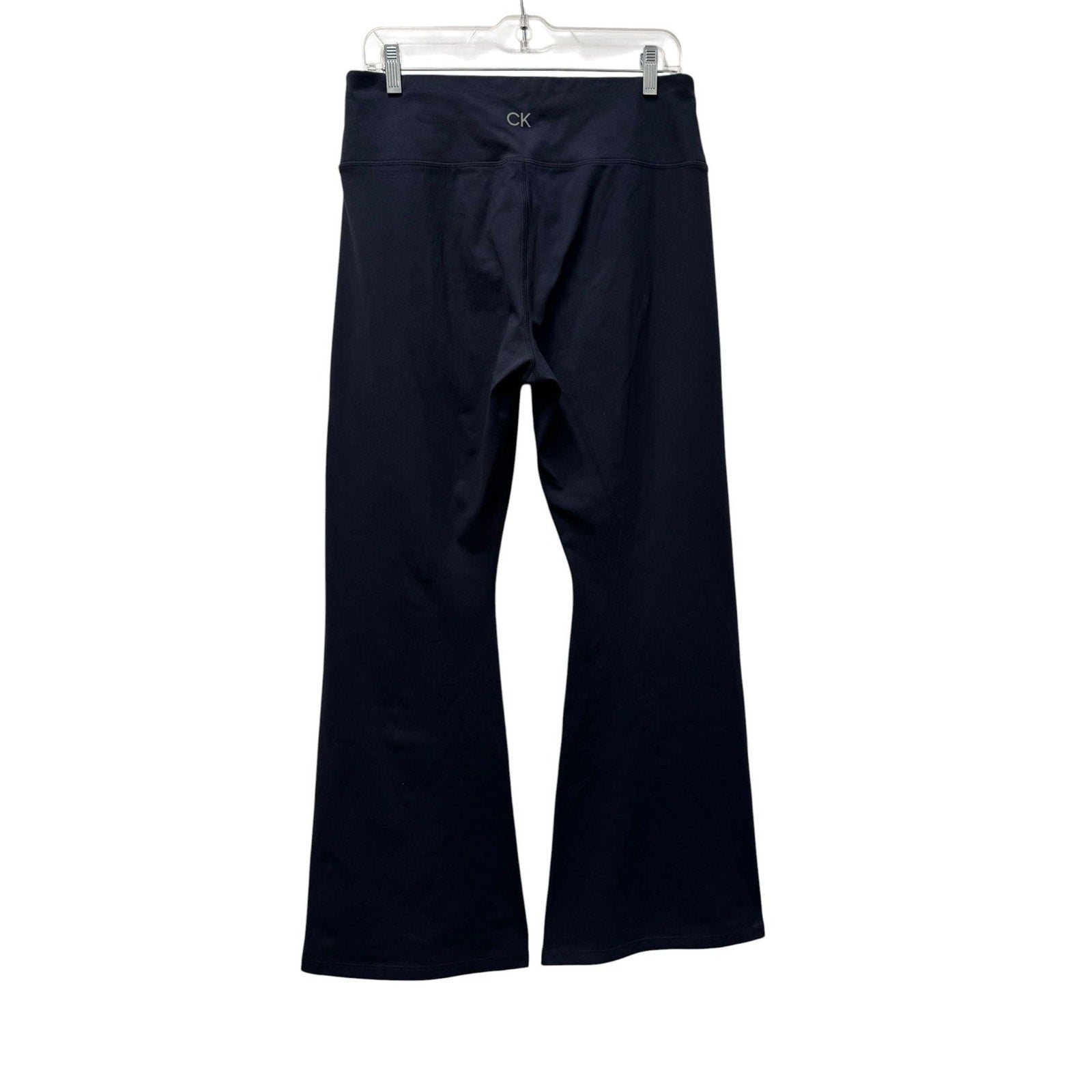 Navy Calvin Klein Performance Stretch pants and zip-up sweatshirt set