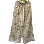 H&M woman's white floral pedal pusher pants in size XS