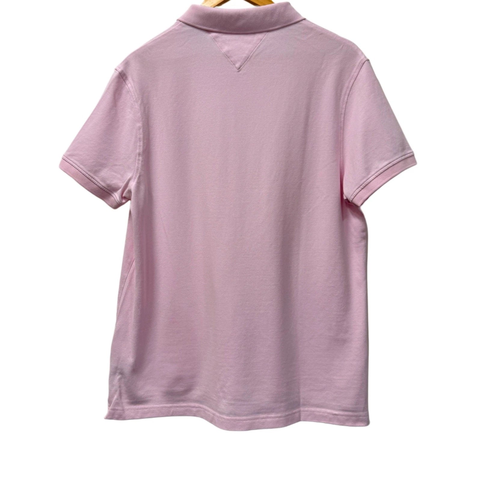 Tommy Hilfiger pink men's polo in size L