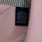 Tommy Hilfiger pink men's polo in size L