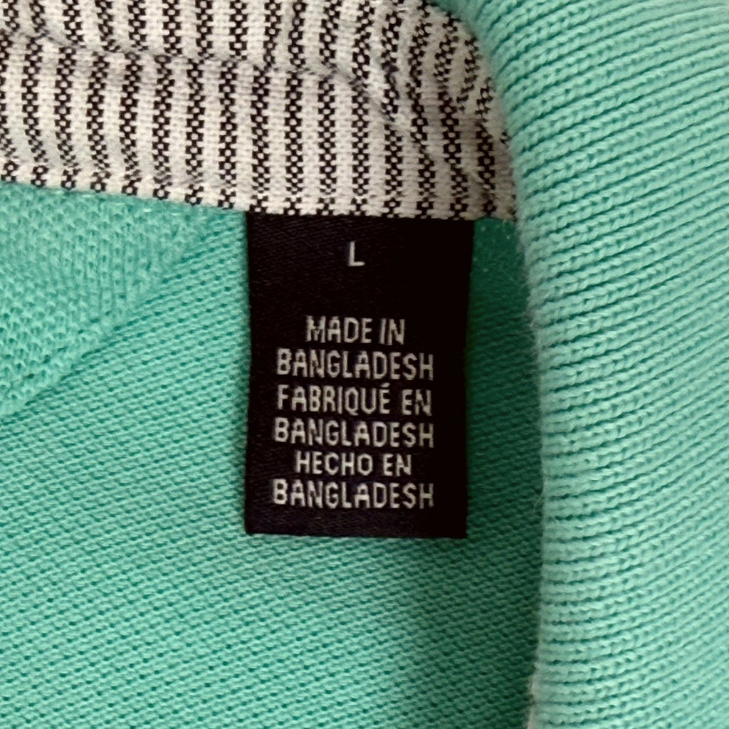 Tommy Hilfiger light blue men's polo in size L