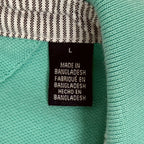 Tommy Hilfiger light blue men's polo in size L