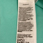 Tommy Hilfiger light blue men's polo in size L