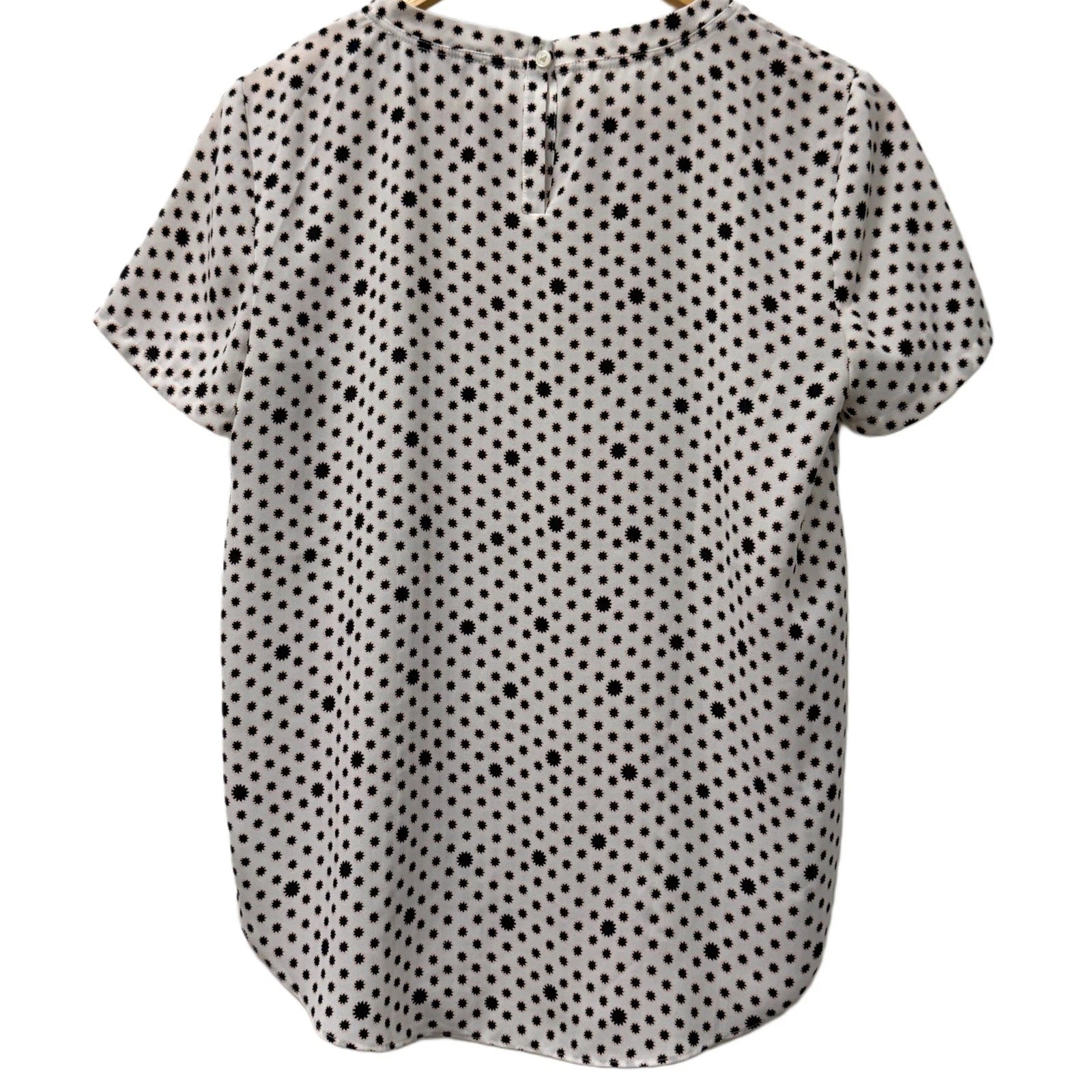 Loft woman's xs white blouse with black flower details
