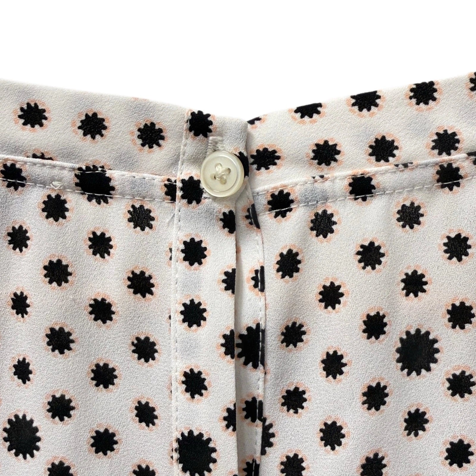 Loft woman's xs white blouse with black flower details