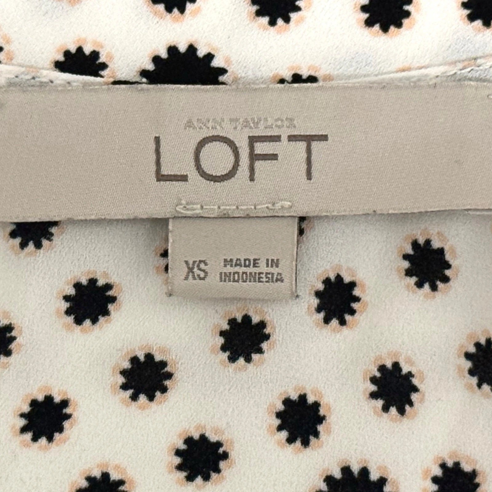 Loft woman's xs white blouse with black flower details