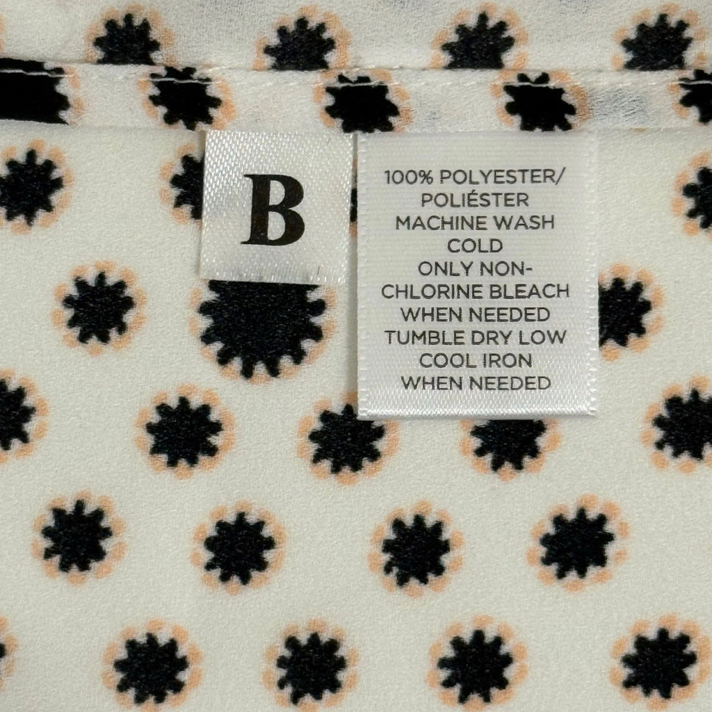 Loft woman's xs white blouse with black flower details